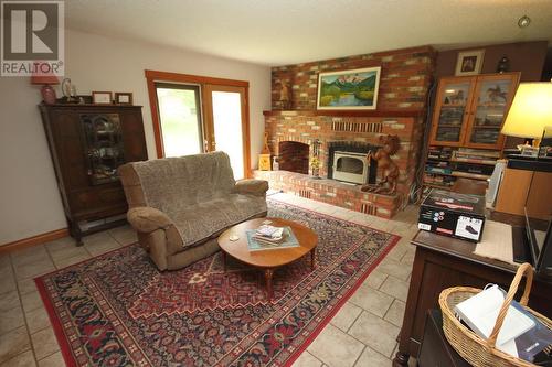 4301 Mclean Creek Road, Okanagan Falls, BC - Indoor Photo Showing Living Room With Fireplace