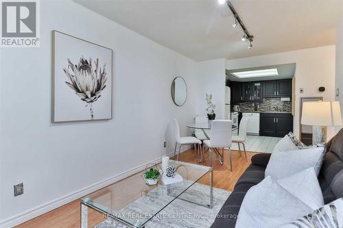 103 - 4450 Tucana Court, Mississauga, ON - Indoor Photo Showing Living Room
