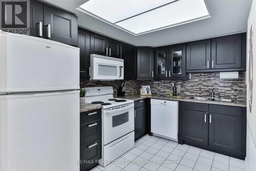 103 - 4450 Tucana Court, Mississauga, ON - Indoor Photo Showing Kitchen With Double Sink