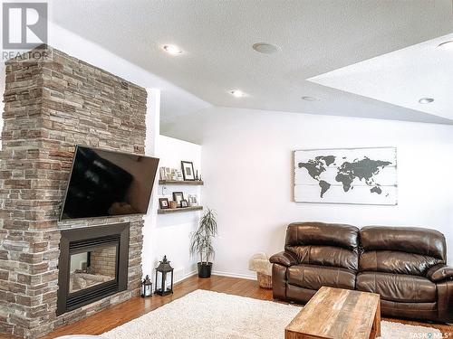 701 Sumner Street, Esterhazy, SK - Indoor Photo Showing Living Room With Fireplace