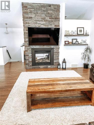701 Sumner Street, Esterhazy, SK - Indoor Photo Showing Living Room With Fireplace