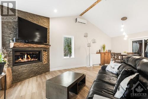 1410 Du Golf Road, Clarence Creek, ON - Indoor With Fireplace