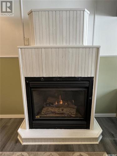 214 4Th Avenue W, Biggar, SK - Indoor Photo Showing Living Room With Fireplace