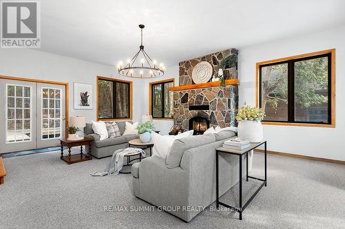 221 Pellisier Street, Grey Highlands, ON - Indoor Photo Showing Living Room With Fireplace