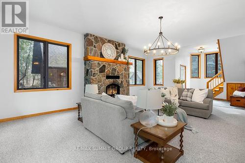 221 Pellisier Street, Grey Highlands, ON - Indoor Photo Showing Living Room With Fireplace
