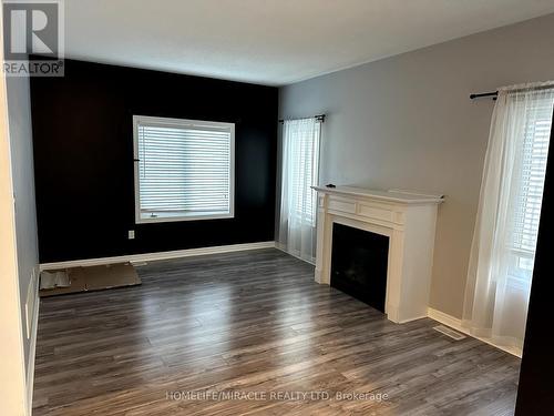 1374 Menefy Place, Milton, ON - Indoor With Fireplace