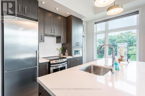 #405 -457 Plains Rd E, Burlington, ON - Indoor Photo Showing Kitchen With Upgraded Kitchen