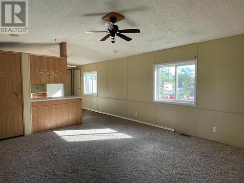 5256 42 Street, Fort Nelson, BC - Indoor Photo Showing Other Room