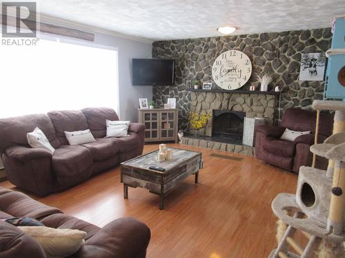 580 Main Street, Bishop'S Falls, NL - Indoor Photo Showing Living Room With Fireplace