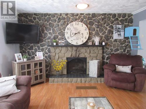 580 Main Street, Bishop'S Falls, NL - Indoor Photo Showing Living Room With Fireplace