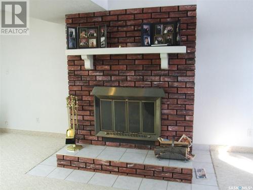 200 Barsness Street, Richmound, SK - Indoor Photo Showing Living Room With Fireplace