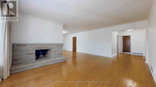 26 Harrison Road, Toronto, ON - Indoor Photo Showing Other Room With Fireplace