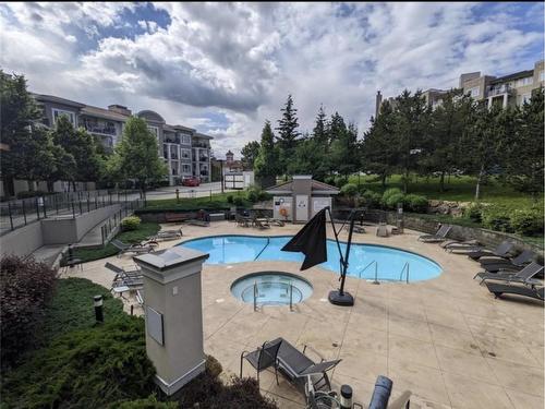 1212-3168 Via Centrale, Kelowna, BC - Outdoor With In Ground Pool