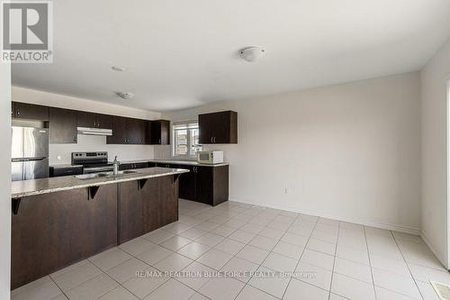 50 Brennan Cres, Loyalist, ON - Indoor Photo Showing Kitchen With Double Sink