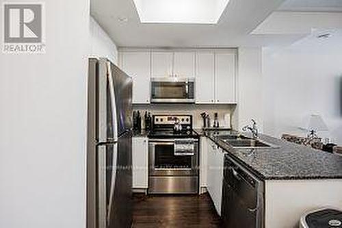 #Th9 -145 Long Branch Ave, Toronto, ON - Indoor Photo Showing Kitchen With Stainless Steel Kitchen