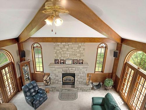 Mezzanine - 101 Ch. Deer Hill, Rigaud, QC - Indoor Photo Showing Living Room With Fireplace