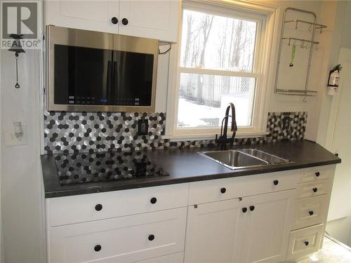 7 Ferguson Road, Elliot Lake, ON - Indoor Photo Showing Kitchen With Double Sink