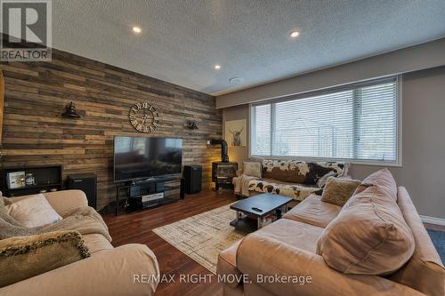 4005 Martindale Cres, Severn, ON - Indoor Photo Showing Living Room With Fireplace