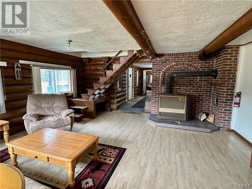 3826 Route 385, Nictau, NB - Indoor Photo Showing Living Room With Fireplace