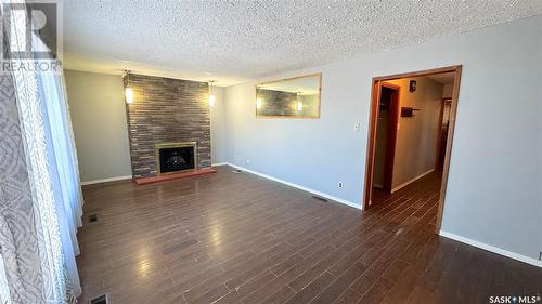 435 8Th Street E, Prince Albert, SK - Indoor Photo Showing Living Room With Fireplace