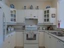 106-877 Klo Road, Kelowna, BC  - Indoor Photo Showing Kitchen With Double Sink 