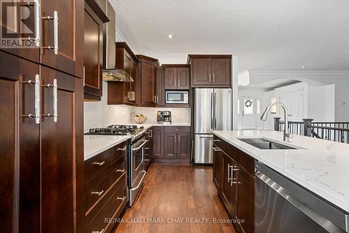 76 Luella Boulevard, Springwater, ON - Indoor Photo Showing Kitchen With Upgraded Kitchen
