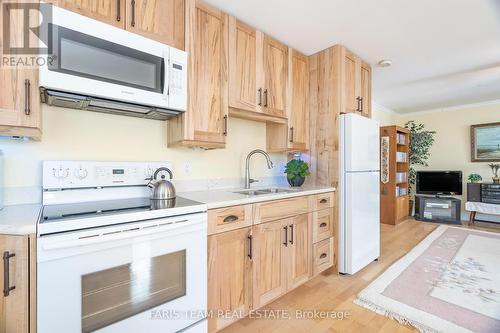 24 Finley Drive, Tiny, ON - Indoor Photo Showing Kitchen With Double Sink