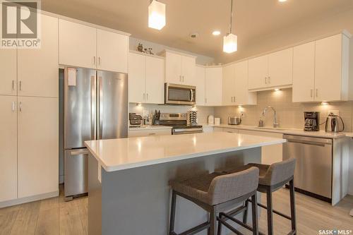 230 105 Willis Crescent, Saskatoon, SK - Indoor Photo Showing Kitchen With Upgraded Kitchen