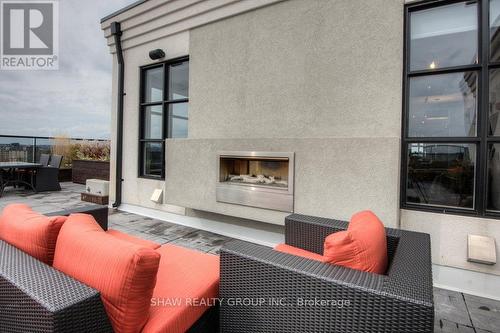 325 - 112 Benton Street, Kitchener, ON - Outdoor With Fireplace With Exterior