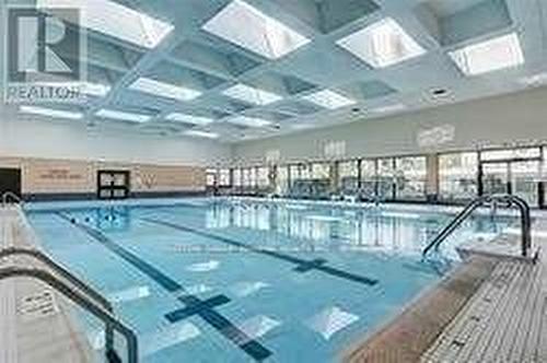 902 - 25 Four Winds Drive, Toronto, ON - Indoor Photo Showing Other Room With In Ground Pool