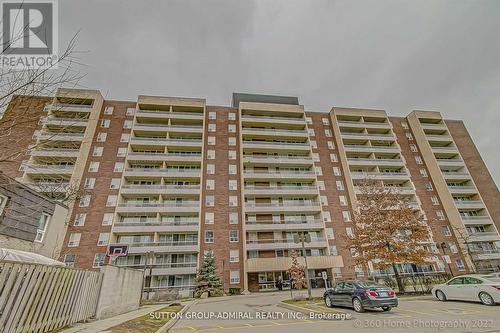 902 - 25 Four Winds Drive, Toronto, ON - Outdoor With Balcony With Facade