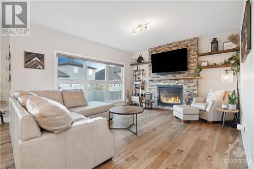 76 Duncanville Street, Russell, ON - Indoor Photo Showing Living Room With Fireplace