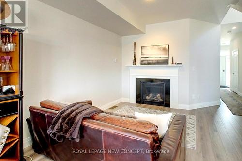 144 Sycamore Street, Blue Mountains, ON - Indoor Photo Showing Living Room With Fireplace