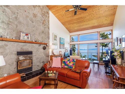 1180 Berry Pt, Gabriola Island, BC - Indoor Photo Showing Living Room With Fireplace