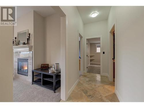 1007 Aurora Heights, West Kelowna, BC - Indoor Photo Showing Other Room With Fireplace