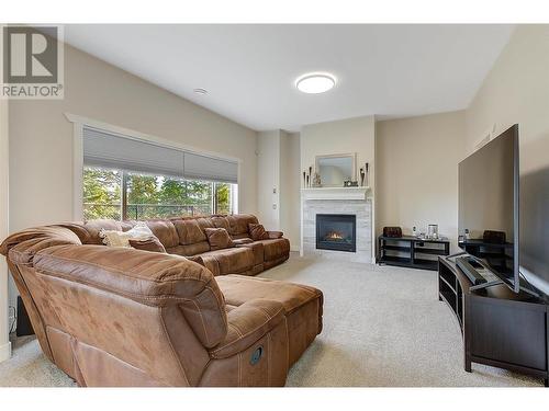 1007 Aurora Heights, West Kelowna, BC - Indoor Photo Showing Living Room With Fireplace