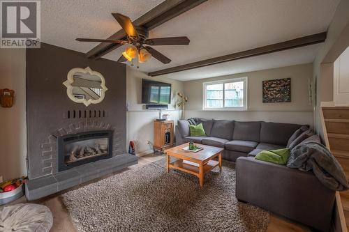 716 Bartlett Drive, Penticton, BC - Indoor Photo Showing Living Room With Fireplace