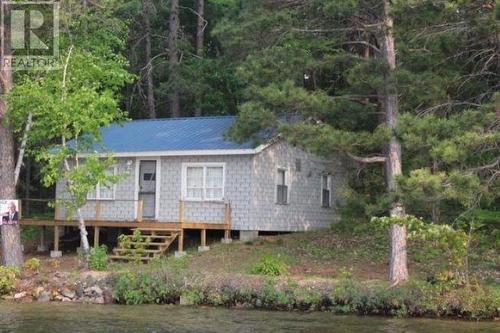 Island "A" Lake Lauzon, Algoma Mills, ON - Outdoor With Body Of Water With Deck Patio Veranda