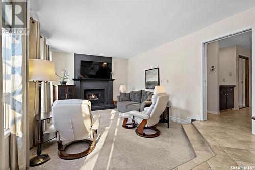 255 Whiteswan Drive, Saskatoon, SK - Indoor Photo Showing Living Room With Fireplace