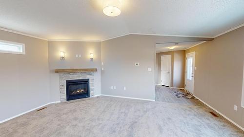 531 Pagurut Avenue W, Cranbrook, BC - Indoor Photo Showing Living Room With Fireplace