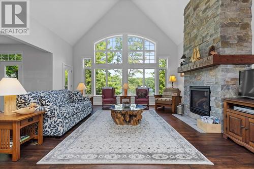 1057 Montgomery Drive, Muskoka Lakes, ON - Indoor Photo Showing Living Room With Fireplace