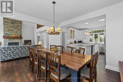 1057 Montgomery Drive, Muskoka Lakes, ON - Indoor Photo Showing Dining Room With Fireplace