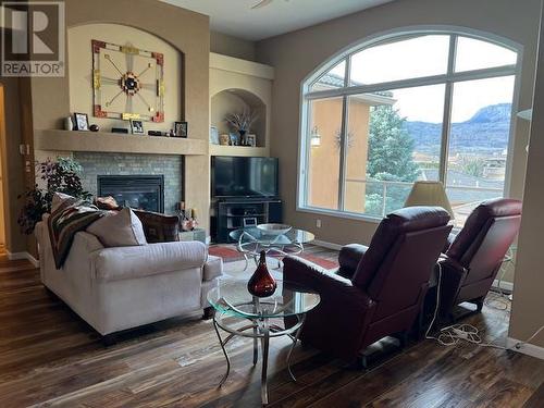 3410 Lobelia Drive, Osoyoos, BC - Indoor Photo Showing Living Room With Fireplace