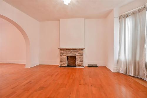 64 East Avenue N, Hamilton, ON - Indoor Photo Showing Other Room With Fireplace