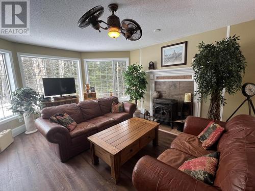 8639 Kroeker Road, Smithers, BC - Indoor Photo Showing Living Room With Fireplace