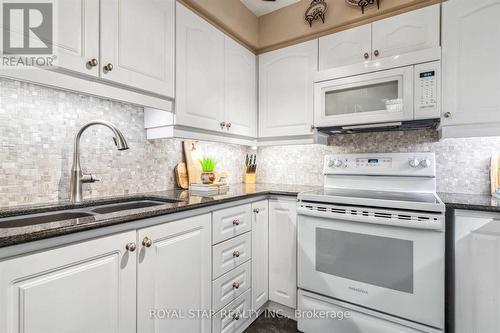 1607 - 1535 Lakeshore Road E, Mississauga, ON - Indoor Photo Showing Kitchen With Double Sink