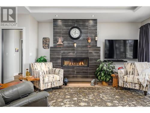 8972 Bayswater Place, Vernon, BC - Indoor Photo Showing Living Room With Fireplace