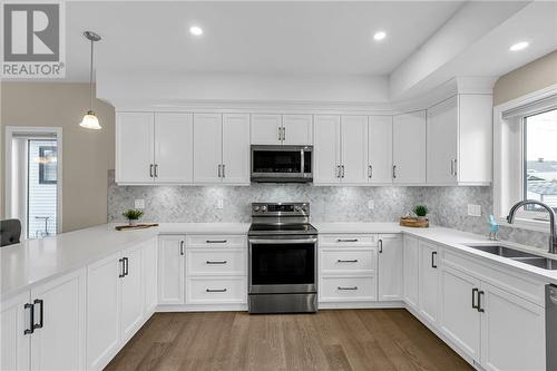 40 Eleanor Drive, Long Sault, ON - Indoor Photo Showing Kitchen With Double Sink With Upgraded Kitchen
