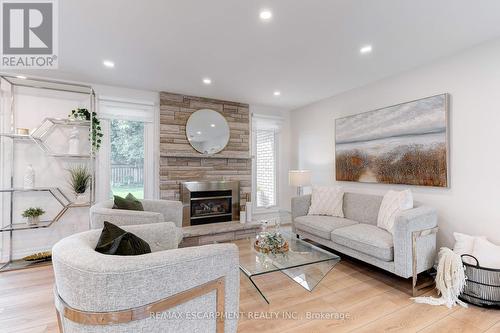 12 Cheval Drive, Grimsby, ON - Indoor Photo Showing Living Room With Fireplace
