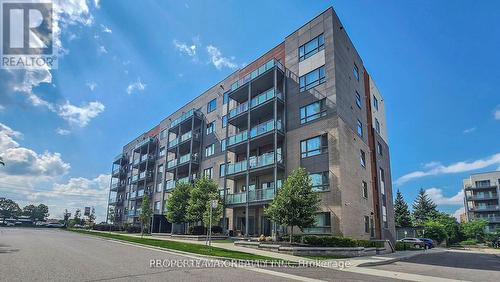 #402 -20 Orchid Place Dr, Toronto, ON - Outdoor With Balcony With Facade